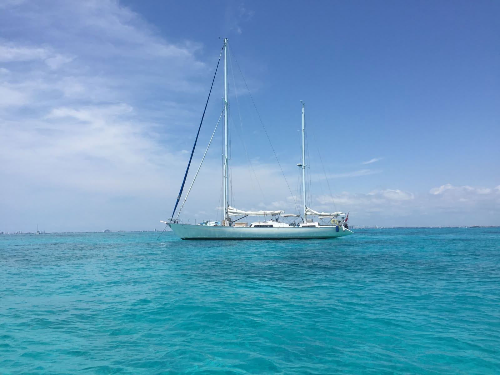 Flying Wing at anchor in turquoise water