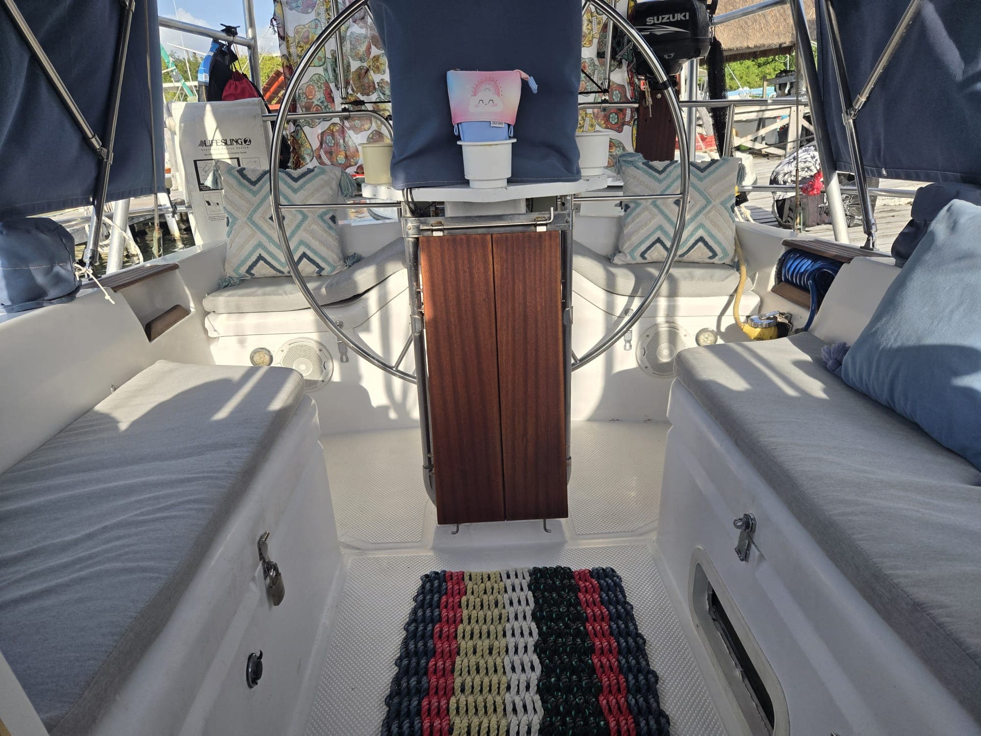 SISU cockpit looking forward past the wheel and cushioned seating