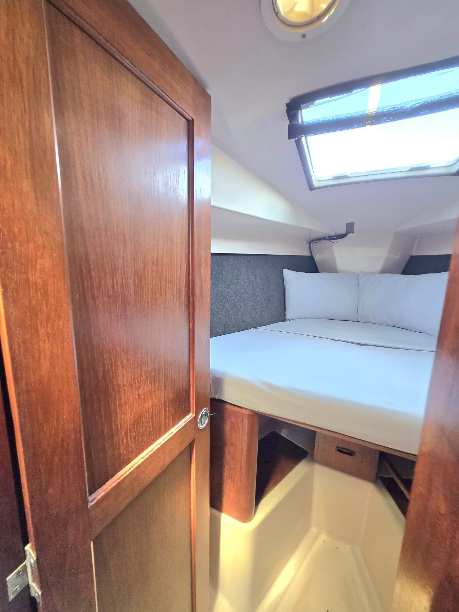 SISU master cabin with double berth and overhead hatch